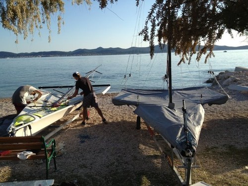 2 x NZL boats in Zadar. Marcus and Josh putting their mast back up after measurement © Peter Burling and Blair Tuke